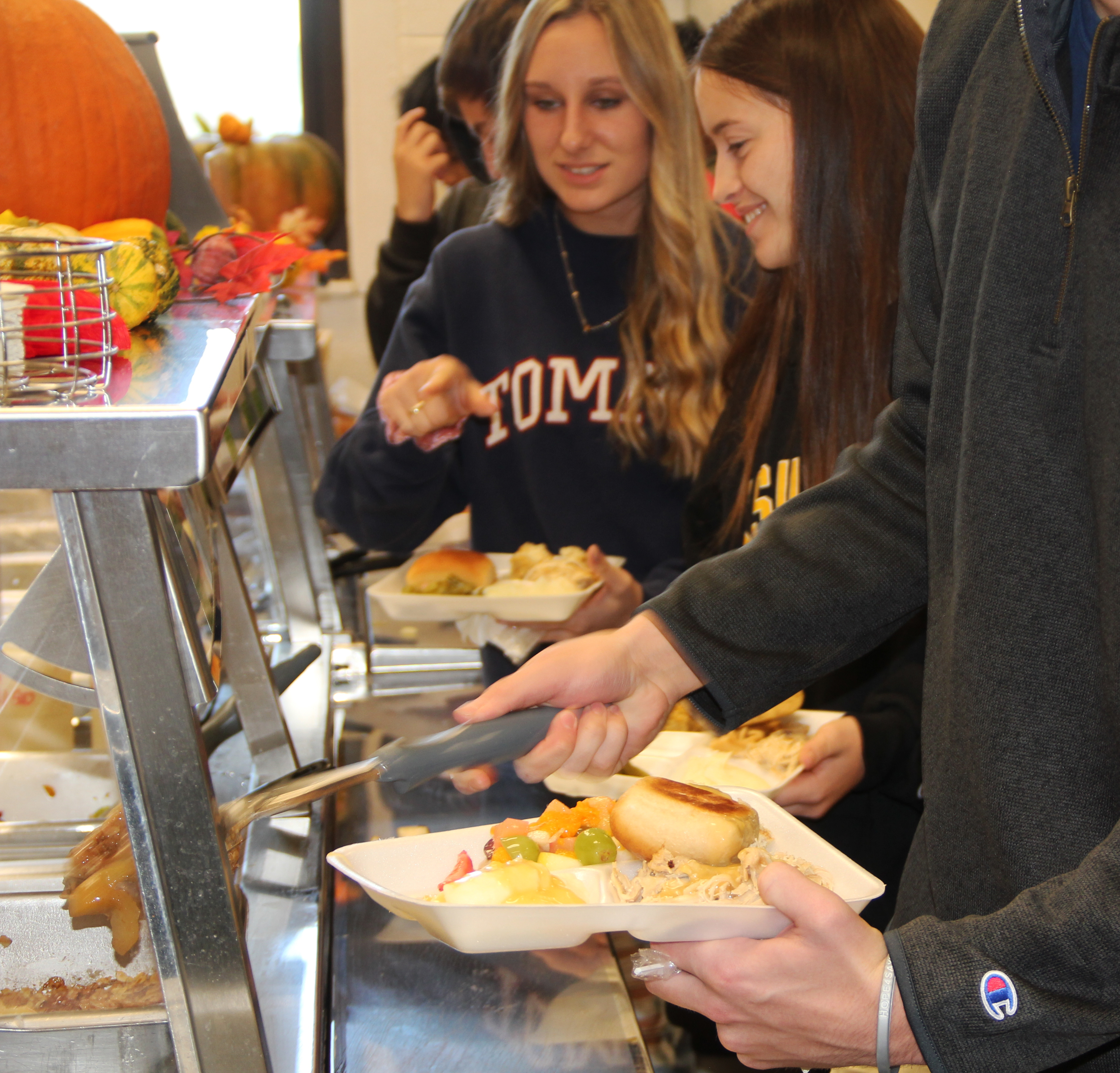 Gilmer High School students enjoying their Thanksgiving lunch line​